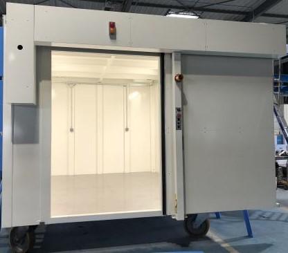 One-piece radiation protection cabinet - 10mm lead; 4m x 3m x 2.6m; Weight 16 tonnes.